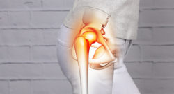 Woman suffering from hip joint pain